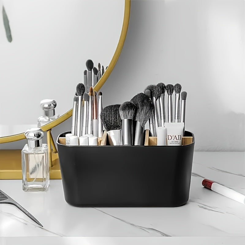 A Lightweight Black Plastic Organizer for The Bathroom Countertop Featuring Five Slots