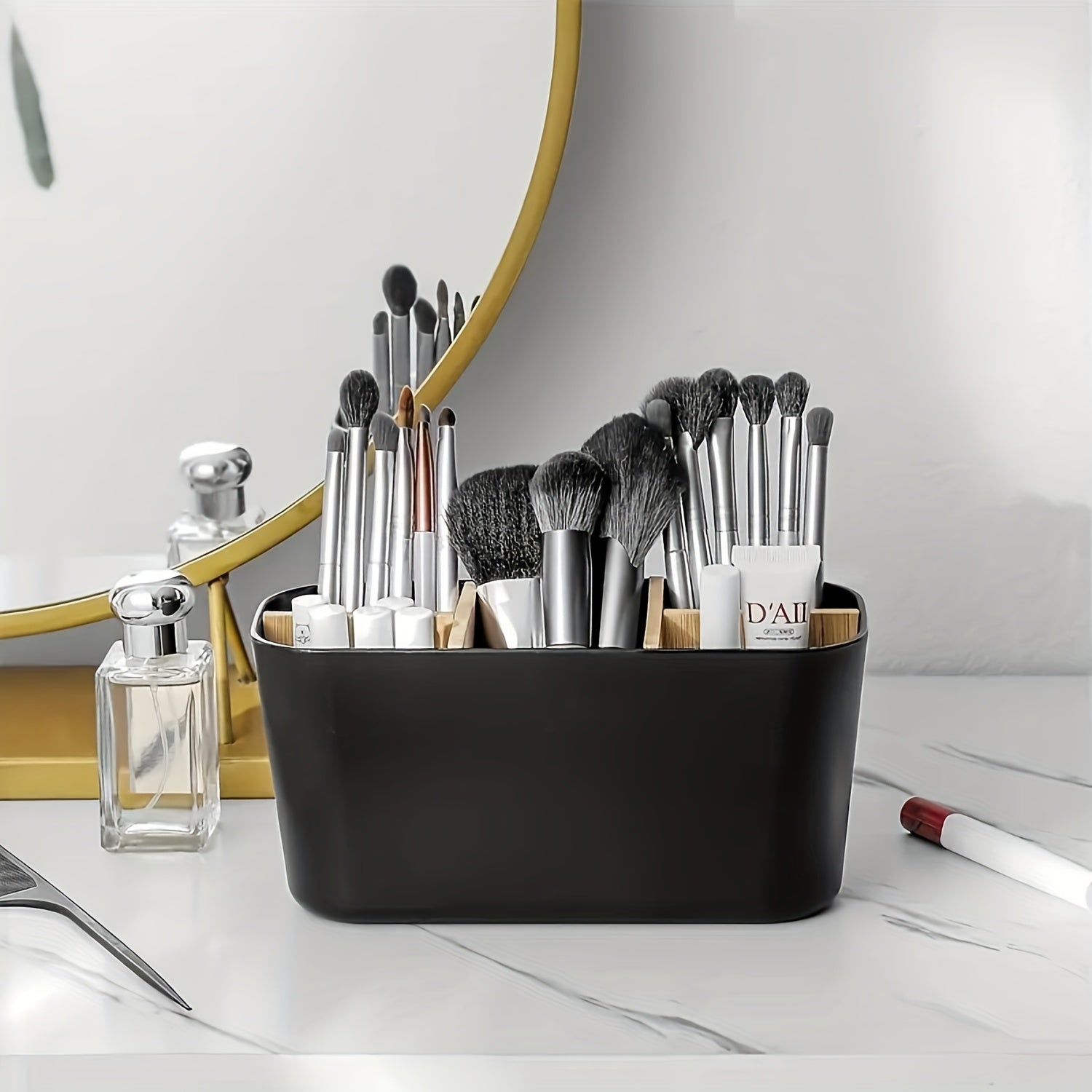 A Lightweight Black Plastic Organizer for The Bathroom Countertop Featuring Five Slots